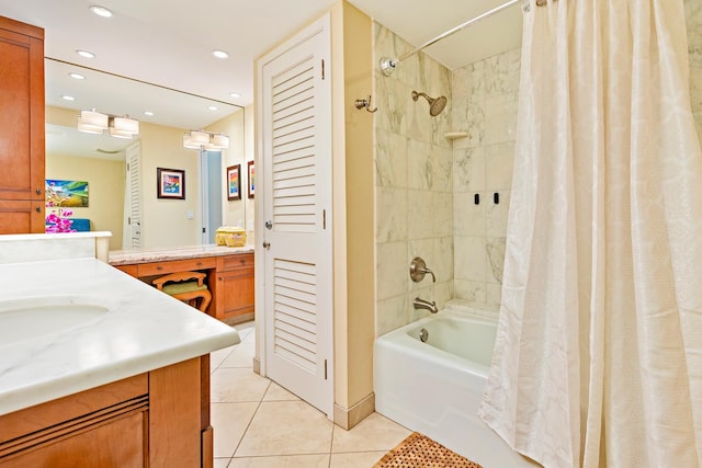 bathroom featuring shower / bathtub combination with curtain, tile patterned floors, and vanity