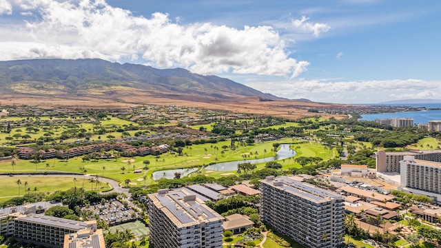 exterior space with a water and mountain view