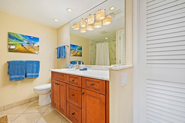 bathroom with vanity, tile patterned flooring, toilet, and curtained shower