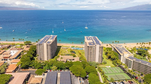 bird's eye view featuring a water view and a view of the beach