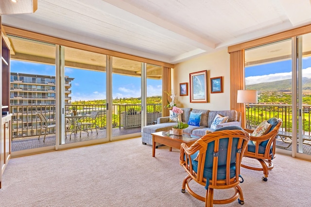 sunroom / solarium with beamed ceiling and a wealth of natural light