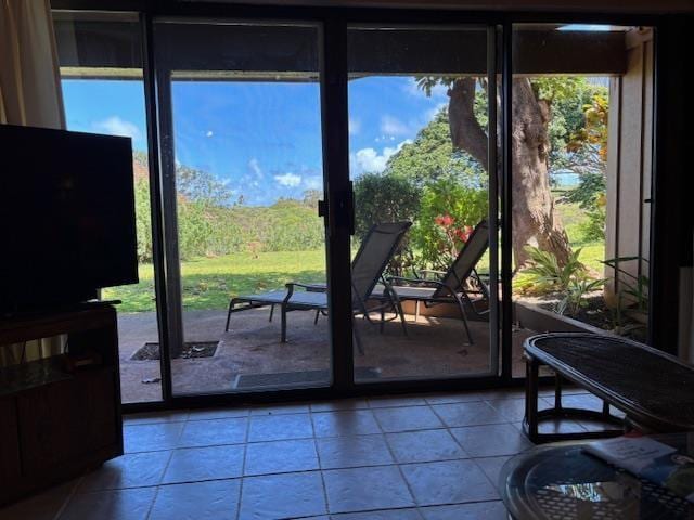 50 Kepuhi Pl Unit 159, Maunaloa, HI 96770 - doorway to outside featuring light tile patterned floors