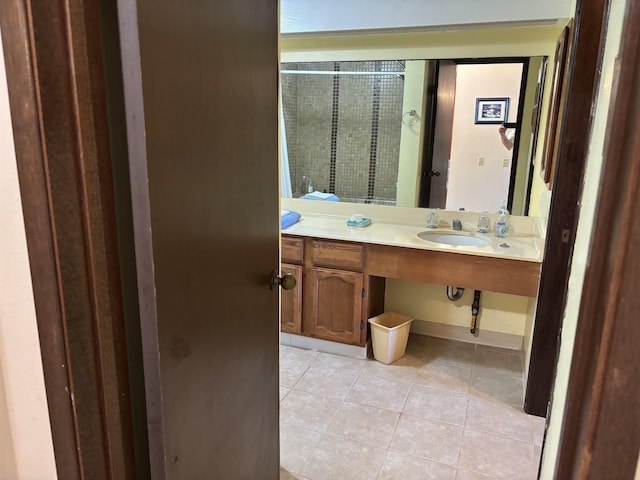50 Kepuhi Pl Unit 159, Maunaloa, HI 96770 - bathroom featuring tile patterned floors, a sink, and a shower with shower door