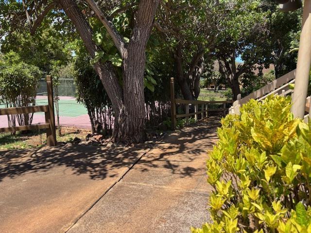 50 Kepuhi Pl Unit 159, Maunaloa, HI 96770 - view of yard featuring a tennis court