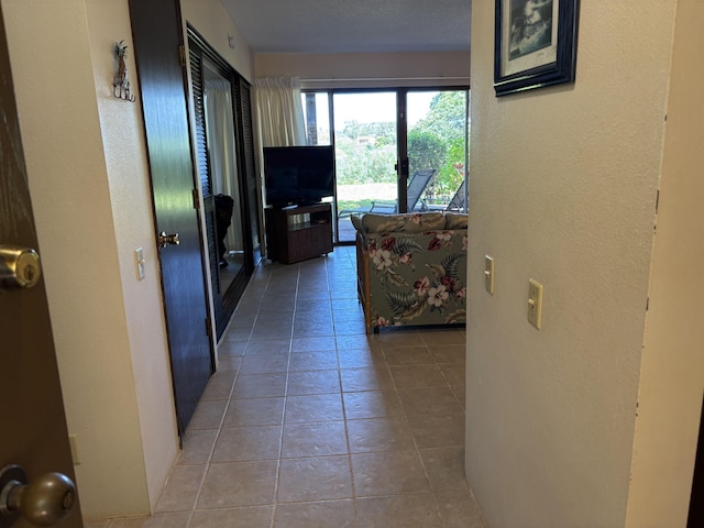 50 Kepuhi Pl Unit 159, Maunaloa, HI 96770 - hall featuring a textured wall and tile patterned floors