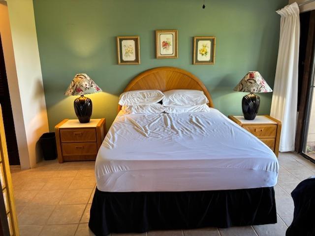 50 Kepuhi Pl Unit 159, Maunaloa, HI 96770 - bedroom featuring light tile patterned floors
