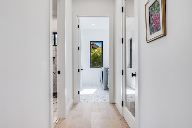 hall featuring light hardwood / wood-style floors