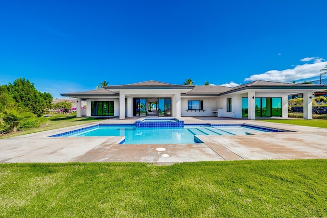 view of pool featuring a yard and a patio