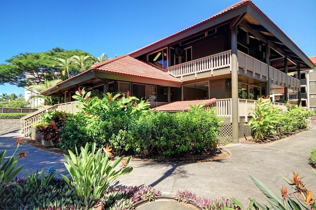 3543 Lower Honoapiilani Rd Unit B401-13B, Lahaina, HI 96761 - view of home's exterior with a tiled roof and a balcony