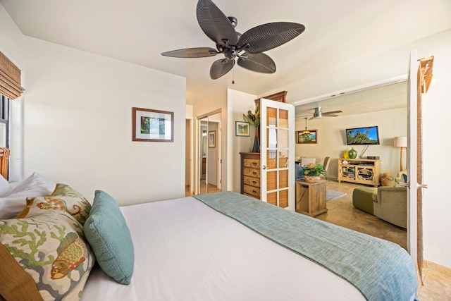 bedroom featuring ceiling fan and light tile patterned flooring