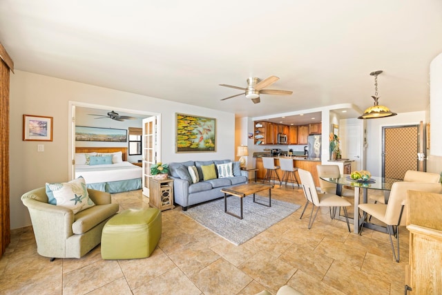 living room featuring ceiling fan