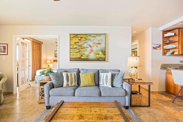 living room with light tile patterned flooring