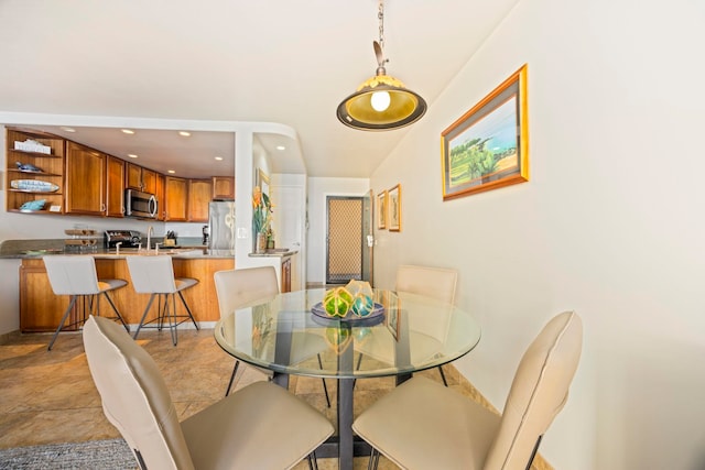 dining room featuring sink