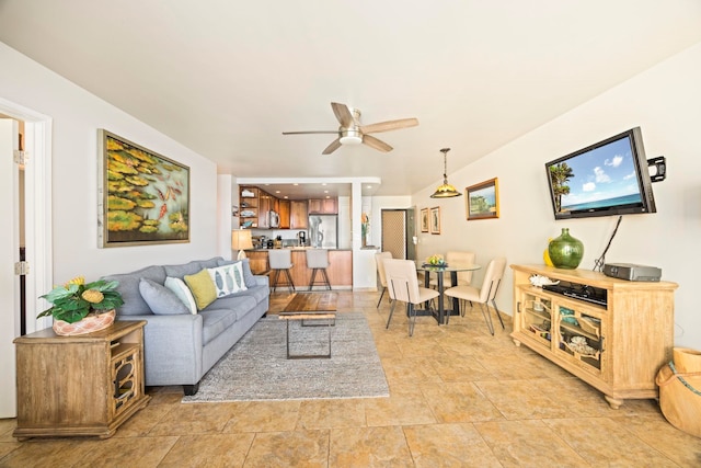 living room with ceiling fan