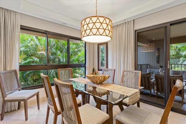 dining space with light tile patterned floors