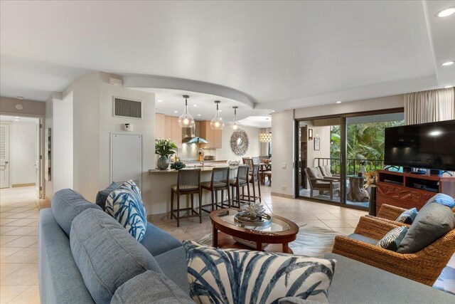 50 Nohea Kai Dr Unit 1-201, Lahaina, HI 96761 - living room with light tile patterned floors, recessed lighting, and baseboards