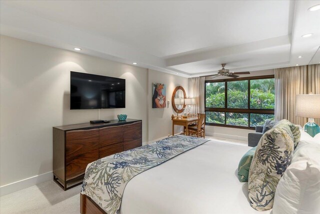 bedroom with ceiling fan and light colored carpet