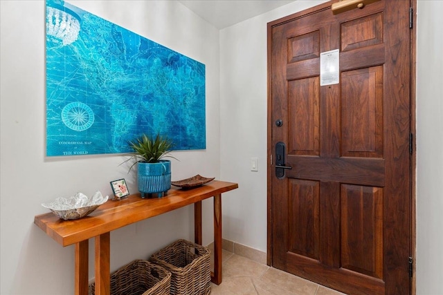 foyer with light tile patterned floors