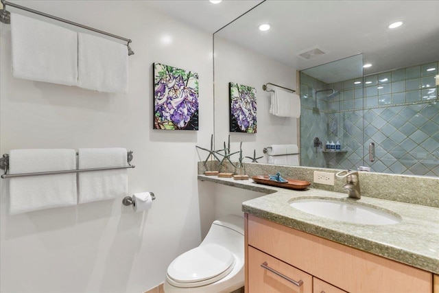 50 Nohea Kai Dr Unit 1-201, Lahaina, HI 96761 - bathroom featuring vanity, toilet, a tile shower, and recessed lighting