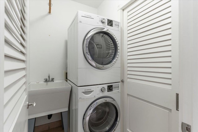 50 Nohea Kai Dr Unit 1-201, Lahaina, HI 96761 - washroom with stacked washing machine and dryer