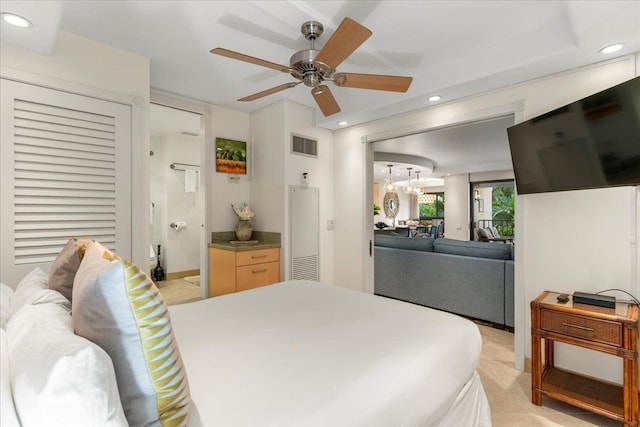 bedroom with ceiling fan and ensuite bathroom