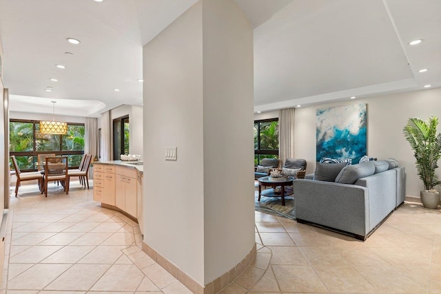 50 Nohea Kai Dr Unit 1-201, Lahaina, HI 96761 - living area featuring light tile patterned flooring, recessed lighting, plenty of natural light, and baseboards