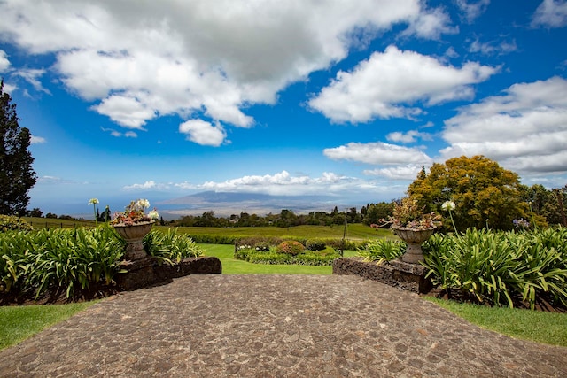 view of patio featuring a mountain view and a rural view