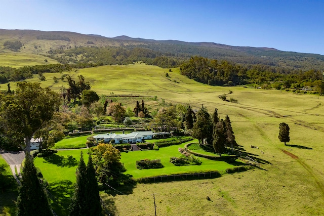 aerial view featuring a mountain view and a rural view