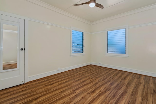 unfurnished room with dark wood-type flooring, ornamental molding, and ceiling fan