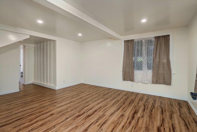 empty room featuring wood-type flooring