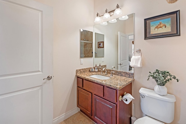 24 One Hali Ln Unit 7-203, Kihei, HI 96753 - bathroom with toilet, vanity, a shower, and baseboards
