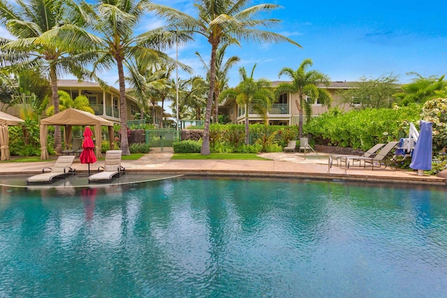 24 One Hali Ln Unit 7-203, Kihei, HI 96753 - swimming pool with a gazebo and a patio