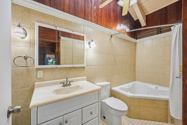 full bathroom featuring vanity, tile patterned flooring, toilet, shower / bath combo with shower curtain, and tile walls