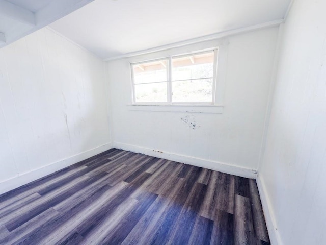 225 S Papa Ave, Kahului, HI 96732 - unfurnished room with dark wood-type flooring, baseboards, and ornamental molding