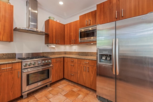 kitchen featuring stainless steel appliances, stone countertops, light tile patterned floors, crown molding, and wall chimney range hood