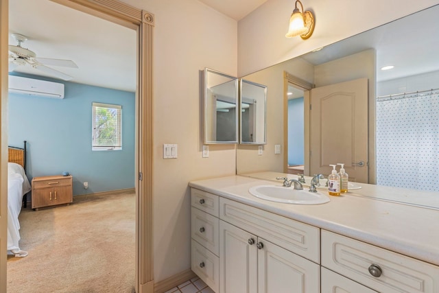 bathroom featuring ceiling fan, vanity, and a wall mounted air conditioner