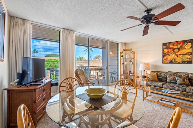 2495 S Kihei Rd Unit 248, Kihei, HI 96753 - dining area featuring a textured ceiling and ceiling fan