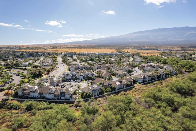 birds eye view of property with a mountain view