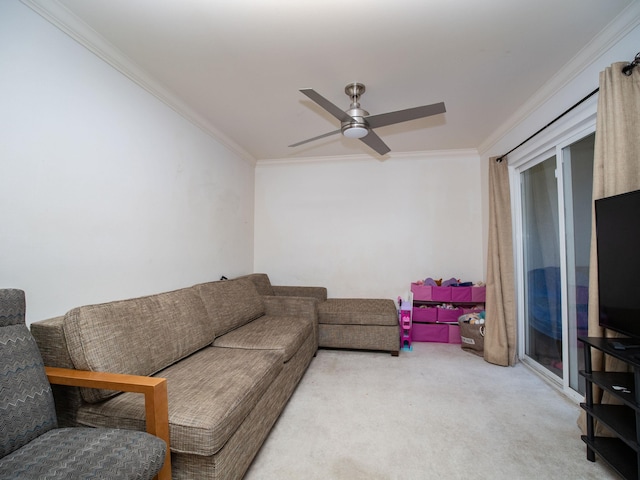 living room with ceiling fan, crown molding, and carpet flooring