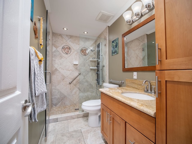 bathroom featuring ornamental molding, vanity, tile patterned flooring, toilet, and walk in shower