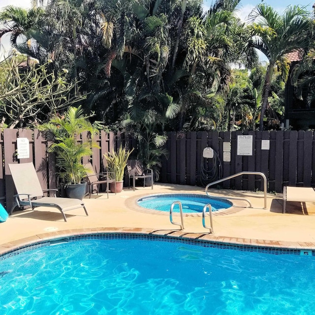 view of swimming pool featuring a patio