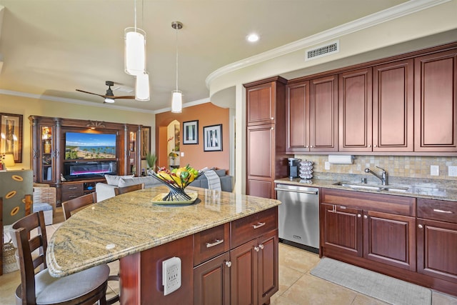 kitchen featuring visible vents, a ceiling fan, open floor plan, a sink, and dishwasher