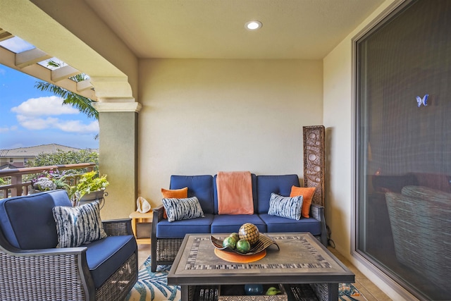 balcony featuring an outdoor living space