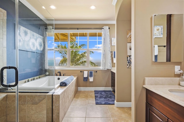bathroom featuring tile patterned flooring, vanity, recessed lighting, baseboards, and a bath