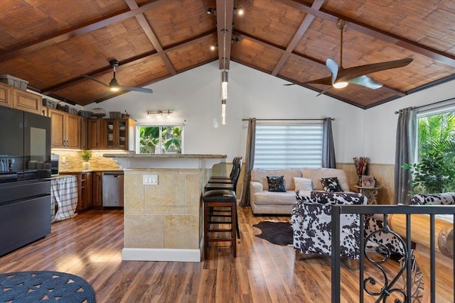 kitchen featuring dark hardwood / wood-style floors, ceiling fan, wooden ceiling, stainless steel dishwasher, and black refrigerator