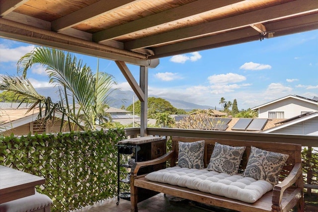 balcony featuring a mountain view