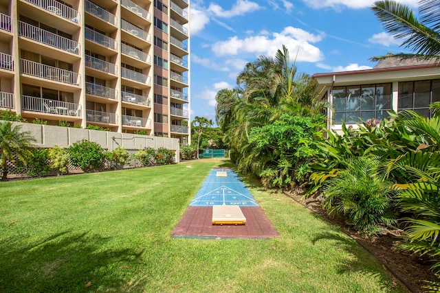 view of community featuring shuffleboard