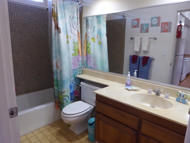 full bathroom with vanity, tile flooring, shower / bath combo, and toilet