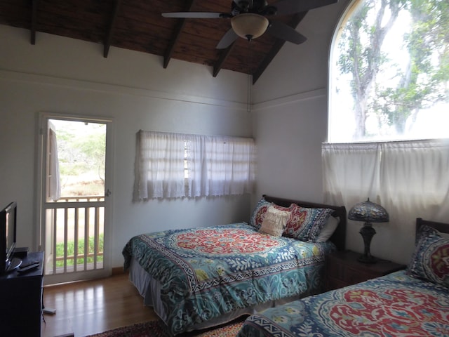 bedroom with wood-type flooring, ceiling fan, lofted ceiling with beams, wood ceiling, and access to outside