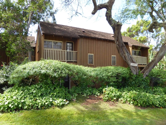 view of home's exterior featuring a balcony